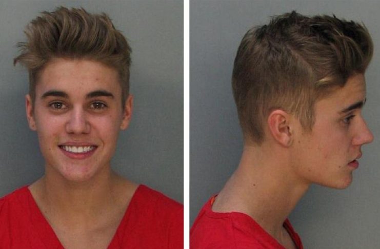 Combination photo of booking photos of Canadian teen pop singer Bieber in Miami Beach