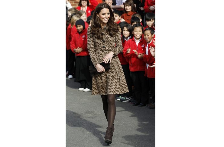 A combination photo shows Britain’s Catherine, Duchess of Cambridge during a visit to the Only Connect head office in London