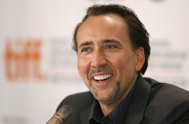 Actor Cage smiles during news conference for film “Bad Lieutenant: Port Of Call New Orleans” at 34th Toronto International Film Festival in Toronto