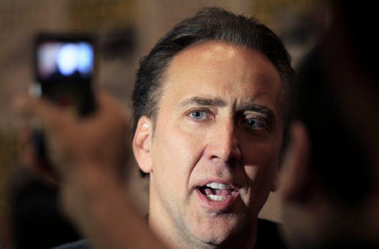 Actor Nicolas Cage is interviewed at Comic Con as he promotes his movie Ghost Rider “Spirit of Vengeance” at the pop culture event in San Diego
