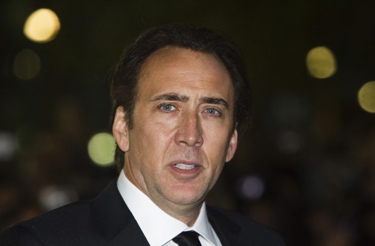 Nicolas Cage arrives at the gala for “Trespass” during the 36th Toronto International Film Festival