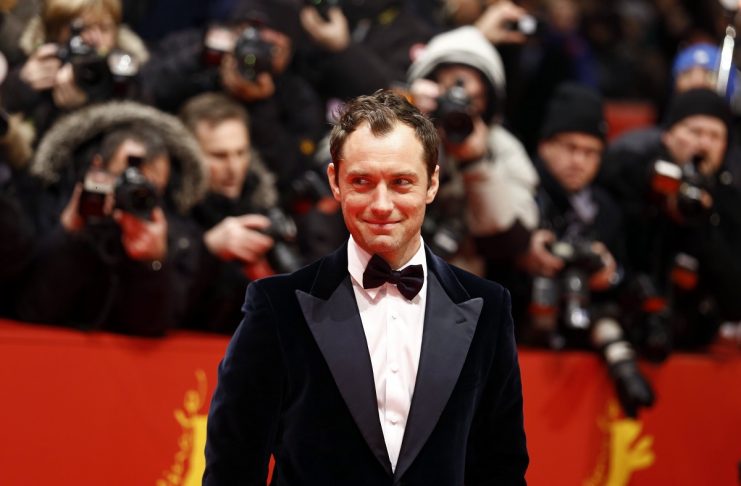 Actor Law poses on the red carpet as he arrives for the screening of the movie “Side Effects” at the 63rd Berlinale International Film Festival in Berlin