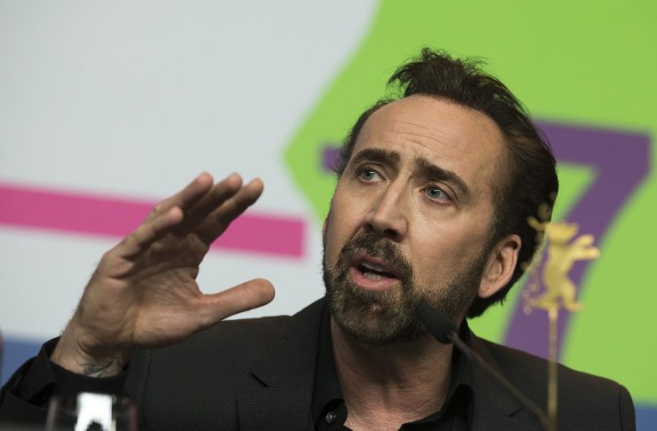 Cage, voice of character Grug, speaks during news conference promoting animation movie “The Croods” at Berlinale International Film Festival in Berlin