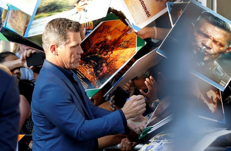 Cast member Brolin signs autographs at the premiere for the movie “Sicario: Day of the Soldado” in Los Angeles
