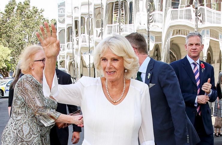 Britain’s Camilla, Duchess of Cornwall, waves to members of the public as she arrives to visit the Len Lye Centre in the town of New Plymouth, New Zealand