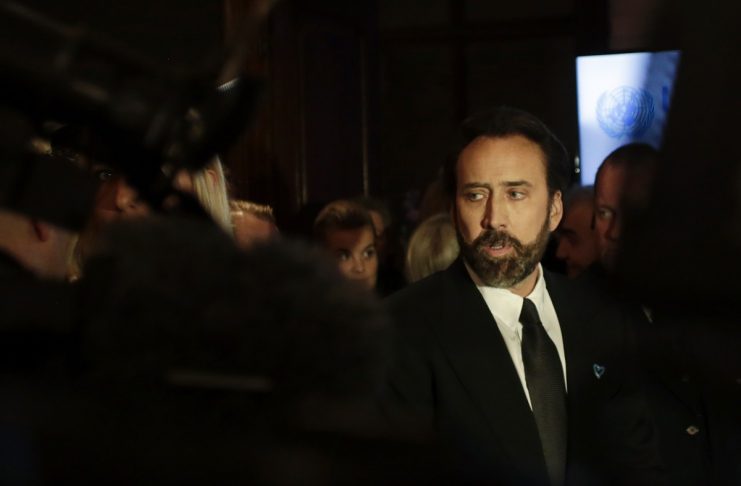 Nicolas Cage, a U.S. actor and a Goodwill Ambassador for the United Nations Office on Drugs and Crime, poses for photographers during a gala event in Vienna