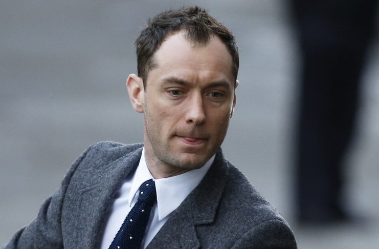 Actor Jude Law arrives to give evidence at the Old Bailey courthouse in London