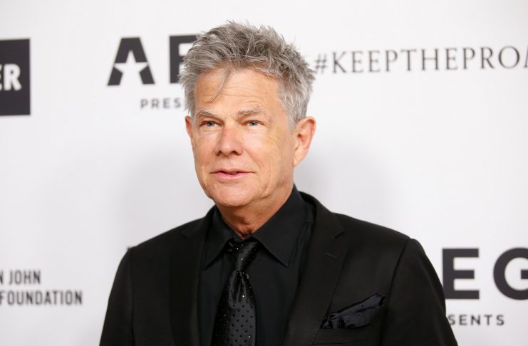 Musician David Foster poses at Elton John’s 70th Birthday and 50-Year Songwriting Partnership with Bernie Taupin benefiting the Elton John AIDS Foundation and the UCLA Hammer Museum at RED Studios Hollywood in Los Angeles