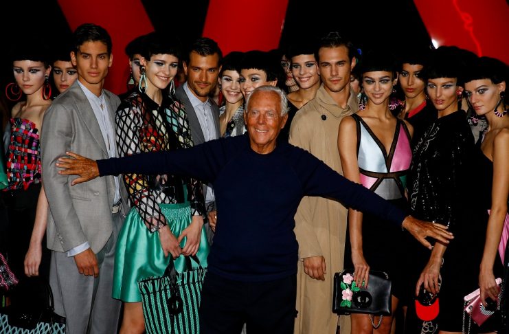 Italian designer Giorgio Armani acknowledges applause at the end of his Spring/Summer 2018 show at the Milan Fashion Week in Milan