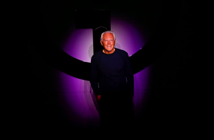 Italian fashion designer Armani acknowledges at the end of his Autumn/Winter 2018 women collection show during Milan Fashion Week in Milan
