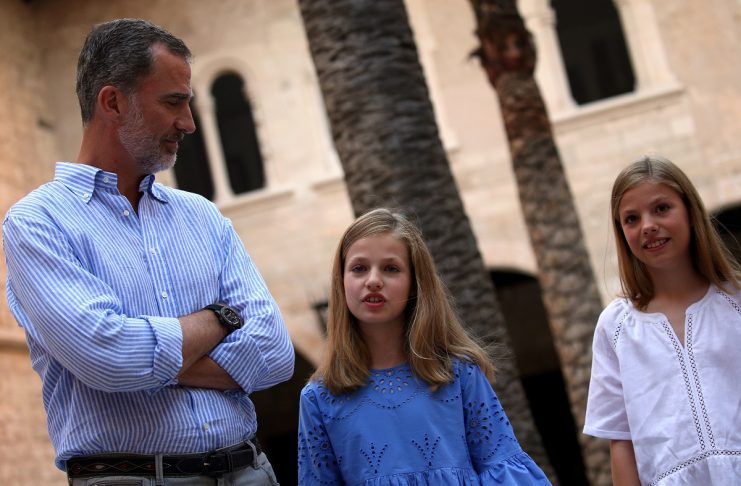 Spain’s King Felipe and daughters Leonor and Sofia pose in Almudaina Palace during their summer holidays in Palma de Mallorca