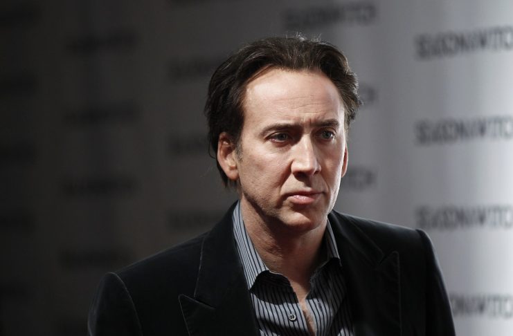 Actor Nicolas Cage arrives for the premiere of the film “Season of the Witch” in New York