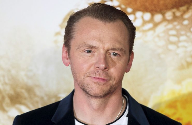 British actor Simon Pegg poses for photographers at a screening of the film “Mission Impossible: Rogue Nation” in London, Britain