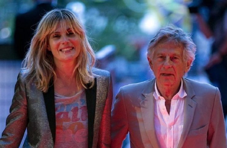 Film director Roman Polanski and his wife Emmanuelle Seigner arrive at the premiere of the film “Blue Jasmine” in Paris