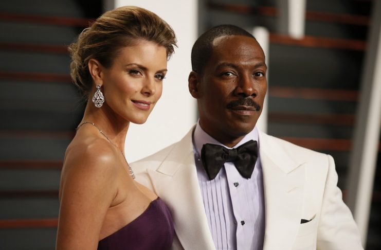 Comedian Eddie Murphy and Paige Butcher arrive at the 2015 Vanity Fair Oscar Party in Beverly Hills