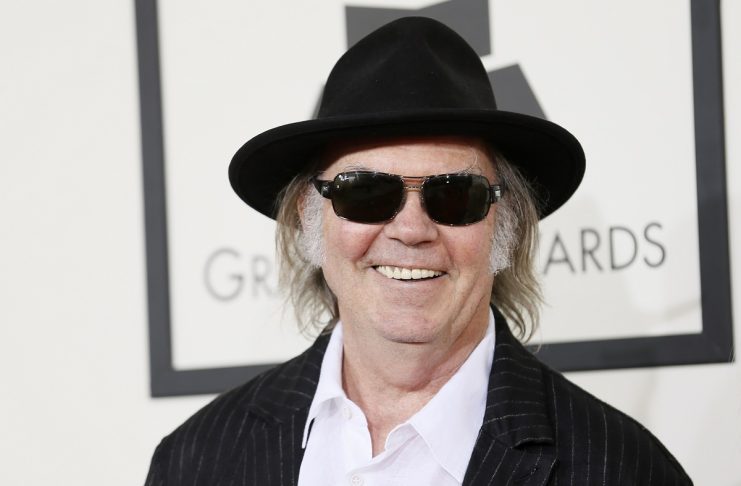 Neil Young arrives at the 56th annual Grammy Awards in Los Angeles