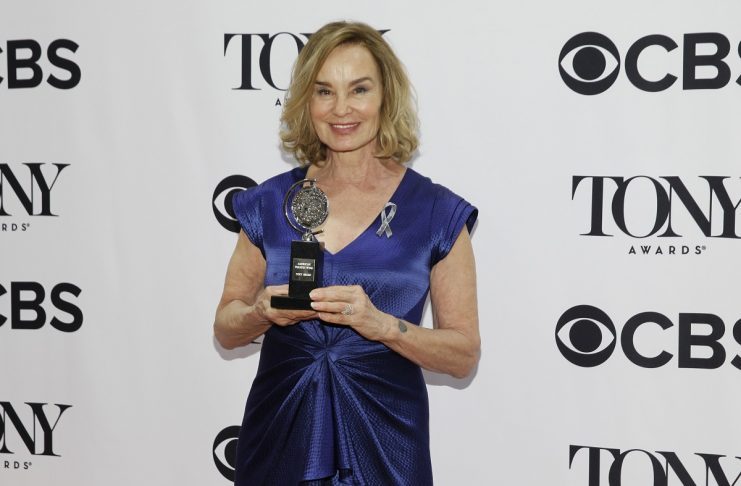 Actress Jessica Lange poses backstage with her award for Best Performance by a Leading Actress in a Play for “Long Day’s Journey into Night” during the American Theatre Wing’s 70th annual Tony Awards in New York