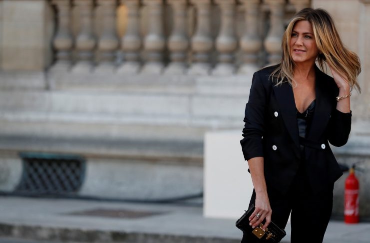 Actress Jennifer Aniston arrives to attend a dinner organized by French luxury group Louis Vuitton for the launching of new leather accessories in Paris