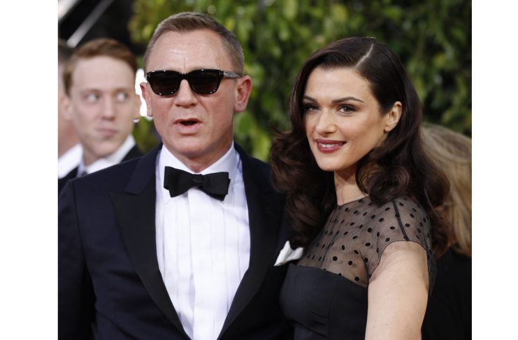 Actor Daniel Craig and his wife, actress Rachel Weisz, arrive at the 70th annual Golden Globe Awards in Beverly Hills
