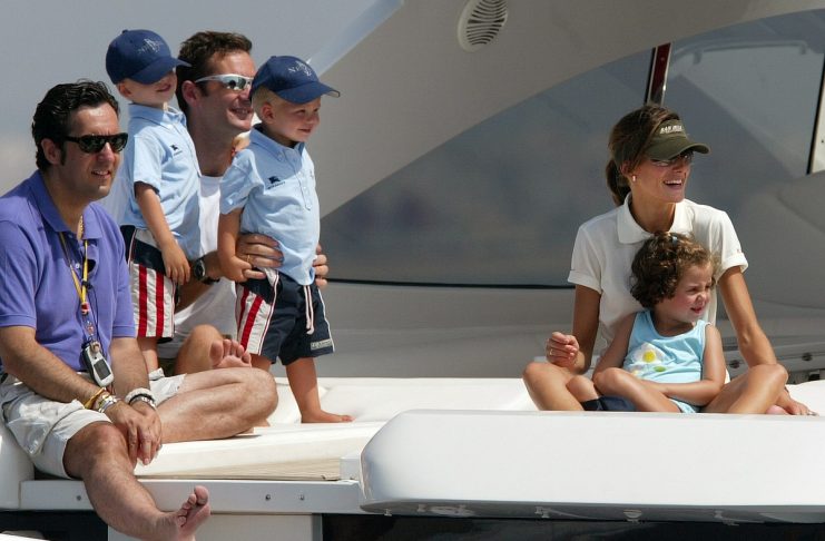 Spanish Princess Letizia sits aboard yacht with fmaily in Mallorca.