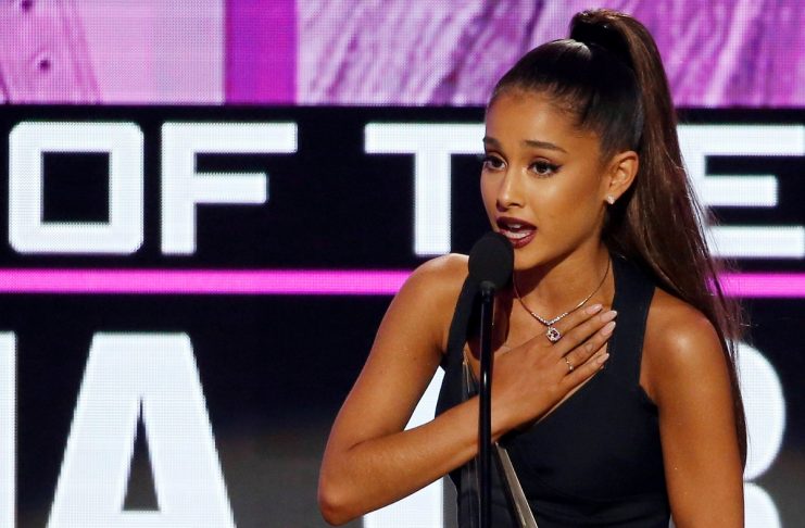 FILE PHOTO: Grande accepts the award for artist of the year at the 2016 American Music Awards in Los Angeles