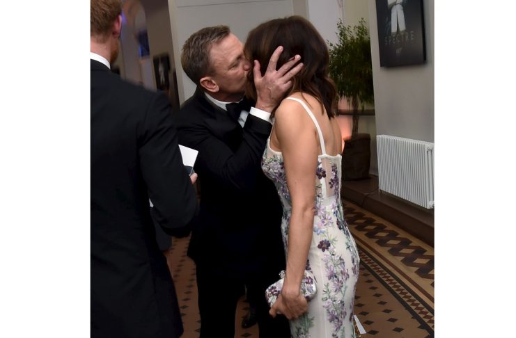Cast member Daniel Craig kisses his wife Rachel Weisz at the world premiere of the new James Bond 007 film “Spectre” at the Royal Albert Hall in London