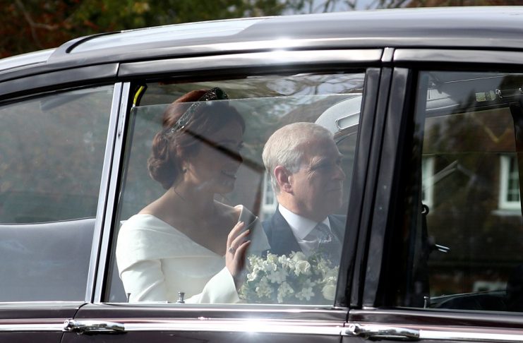 Princess Eugenie is driven towards St George’s Chapel with her father Prince Andrew, Duke of York,  for her wedding to Jack Brooksbank at in Windsor Castle, Windsor