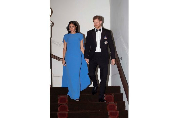 Britain’s Prince Harry and Meghan, the Duchess of Sussex, arrive for a reception and state dinner at Grand Pacific Hotel in Suva
