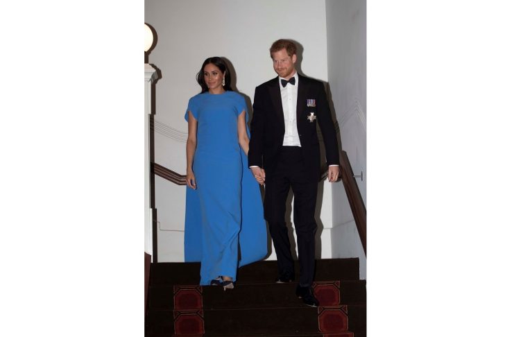 Britain’s Prince Harry and Meghan, the Duchess of Sussex, arrive for a reception and state dinner at Grand Pacific Hotel in Suva