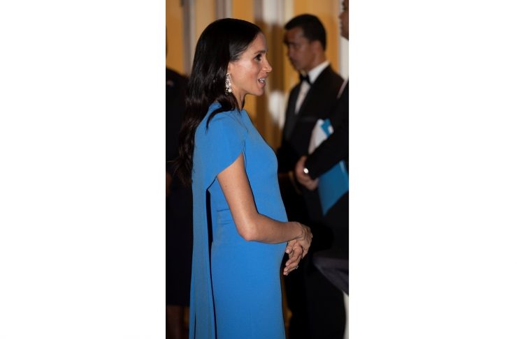 Britain’s Meghan, the Duchess of Sussex, arrives for a reception and state dinner hosted by Fiji’s President Jioji Konrote at Grand Pacific Hotel in Suva