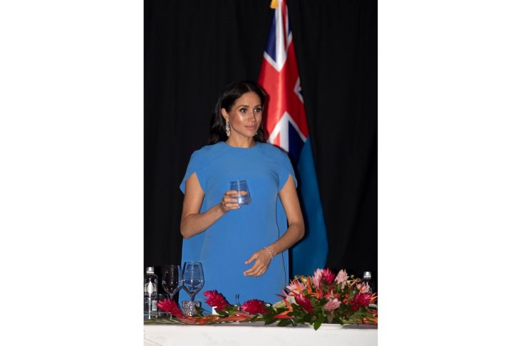 Britain’s Meghan, the Duchess of Sussex, attends a state dinner at Grand Pacific Hotel in Suva, Fiji