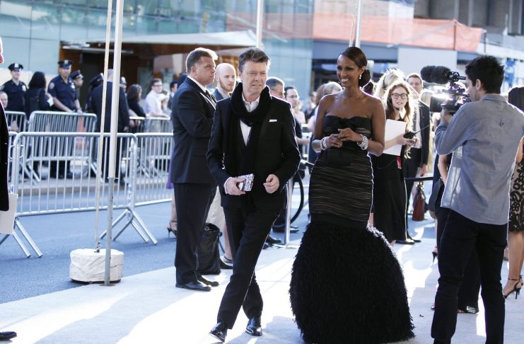 Singer Bowie arrives with his wife Iman to attend the CFDA fashion awards in New York