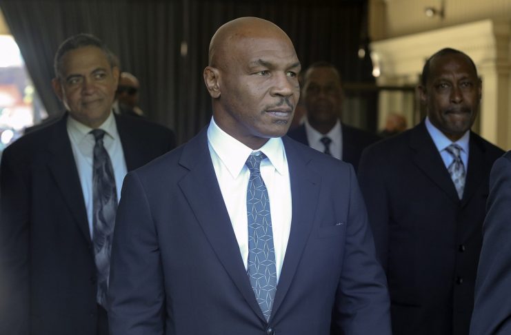 Pallbearer Mike Tyson leaves the funeral home to attend Muhammad Ali’s memorial in Louisville