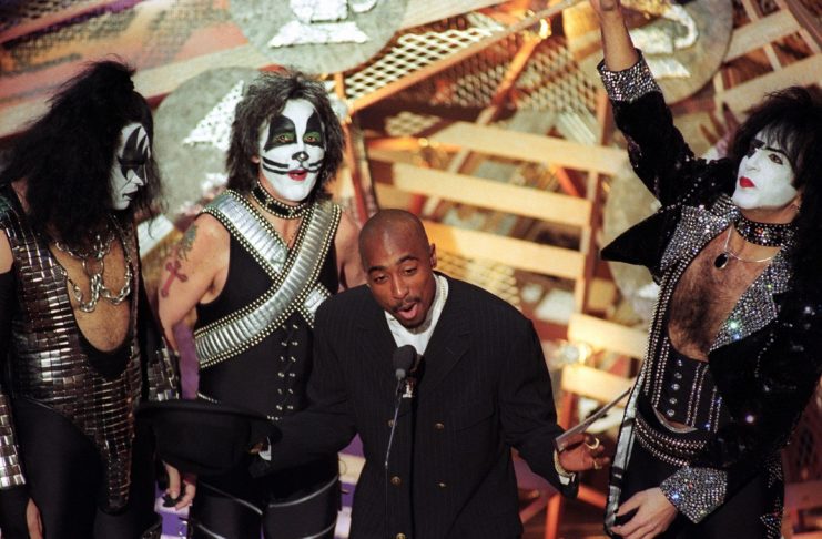 Tupac Shakur and Kiss present the Best Pop Performance by a Duo or Group award at the Grammy Awards in Los Angeles