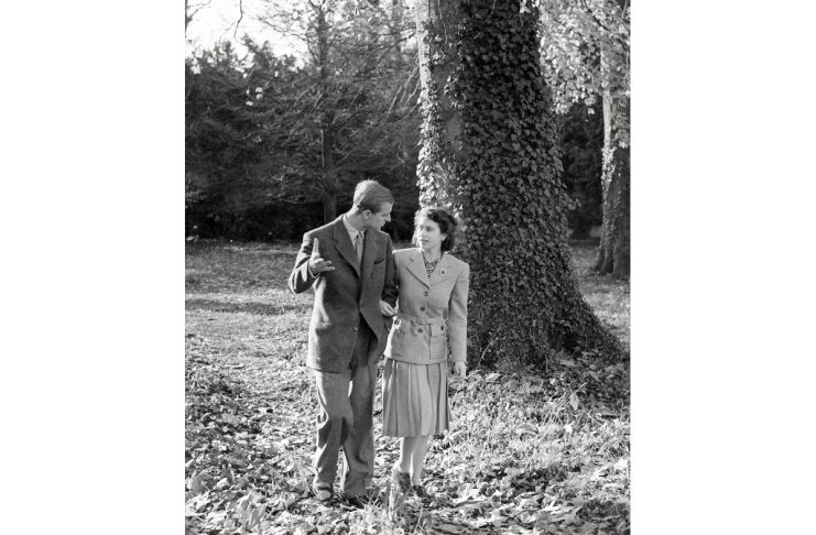 A Royal Collection handout photograph of Princess Elizabeth and The Duke of Edinburgh walking in the grounds of Broadlands, during their honeymoon