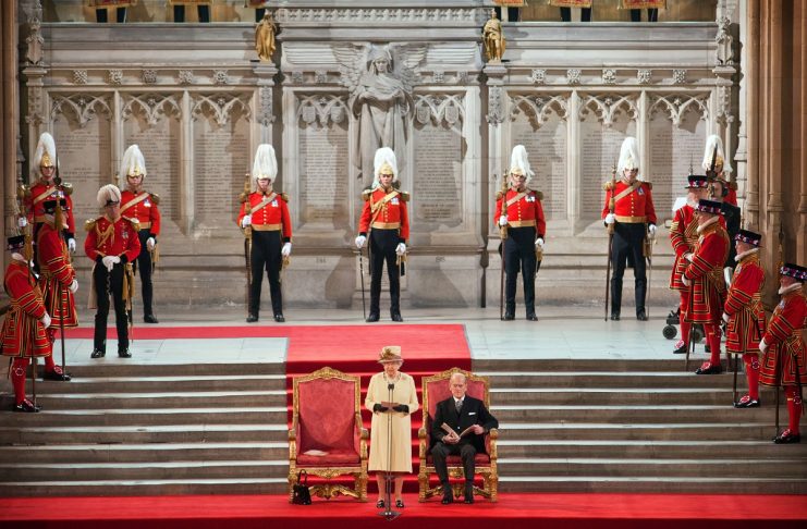 Britain’s Queen Elizabeth addresses both Houses of Parliament, next to her husband Prince Philip at Westminster Hall in London