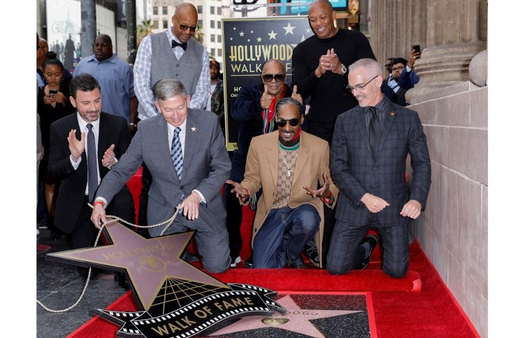 Rapper Snoop Dogg receives his star on the “Hollywood Walk of Fame” with Dr. Dre. Quincy Jones and Jimmy Kimmel in Los Angeles