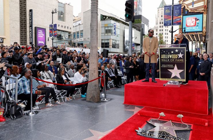 Record producer Quincy Jones introduces rapper Snoop Dogg as he receives his star on the  “Hollywood Walk of Fame” in Los Angeles