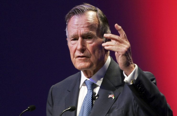 Former U.S. President George Bush speaks at the World Leadership Summit in Abu Dhabi