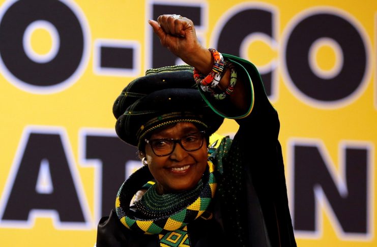 Winnie Madikizela Mandela, ex-wife of former South African president Nelson Mandela, gestures to supporters at the 54th National Conference of the ruling African National Congress (ANC) at the Nasrec Expo Centre in Johannesburg