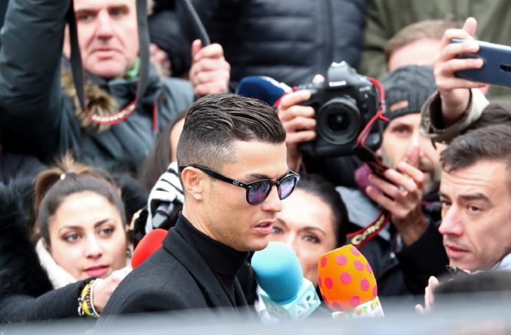 Portugal’s soccer player Cristiano Ronaldo leaves after appearing in court on a trial for tax fraud in Madrid