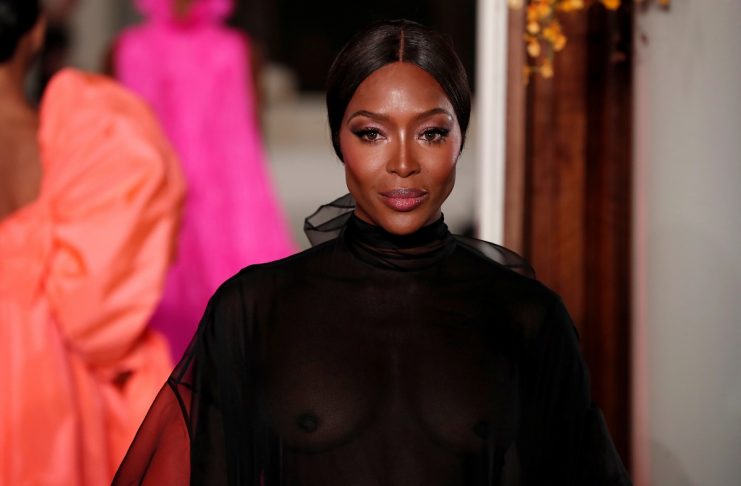 Model Naomi Campbell presents a creation by Italian designer Pier Paolo Piccioli as part of his Haute Couture Spring-Summer 2019 collection show for fashion house Valentino in Paris