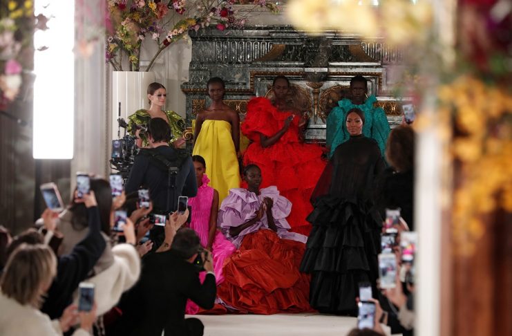Model Naomi Campbell stands with models at the end of Italian designer Pier Paolo Piccioli’s Haute Couture Spring-Summer 2019 collection show for fashion house Valentino in Paris