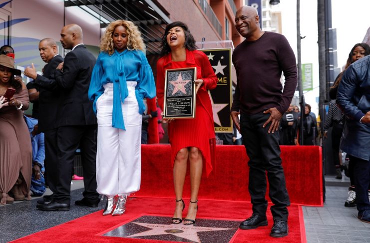 Actor Taraji P. Henson poses with Mary J. Blige and director John Singleton after receiving a star on Hollywood’s Walk of Fame in Los Angeles