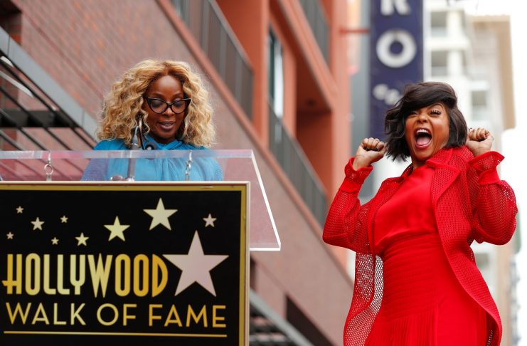 Actor Taraji P. Henson reacts as her friend singer Mary J.Blige introduces her at Henson’s ceremony to receive a star on Hollywood’s Walk of Fame in Los Angeles