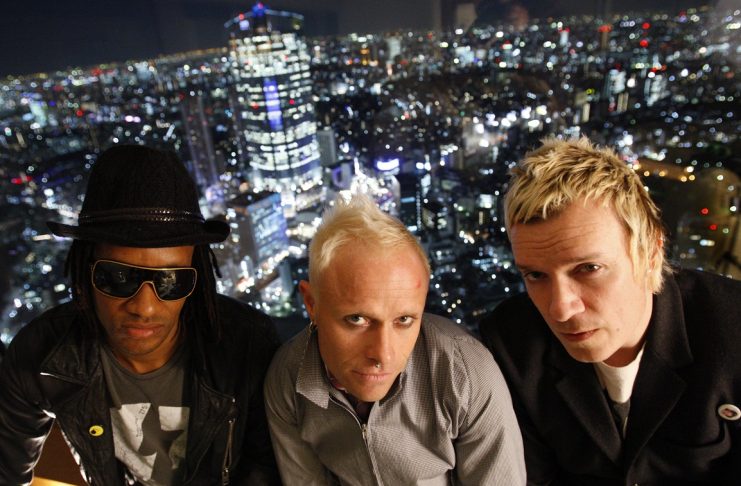 British techno group “The Prodigy” Maxim, Flint and Howlett pose after their interview with Reuters in Tokyo