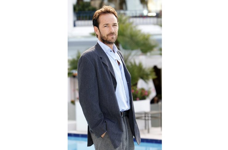 U.S. actor Luke Perry poses during a photocall to promote his television series “Goodnight For Justice” at the annual MIPCOM television programme market in Cannes