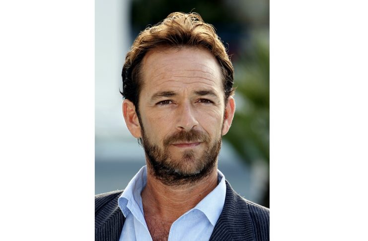 U.S. actor Luke Perry poses during a photocall to promote his television series “Goodnight For Justice” at the annual MIPCOM television programme market in Cannes