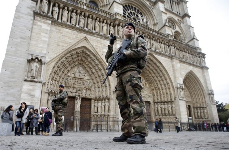 Soldiers patrol in front of the Notre Dame Cathedral in Paris after last Friday’s series of deadly attacks in the French capital