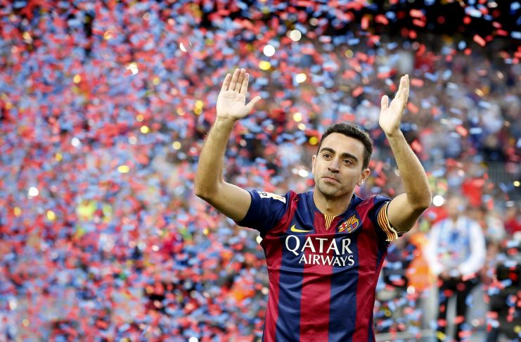 Barcelona’s Xavi Hernandez waves to supporters after their Spanish first division soccer match against Deportivo de la Coruna at Camp Nou stadium in Barcelona